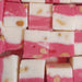 Pink and white peanut fudge squares
